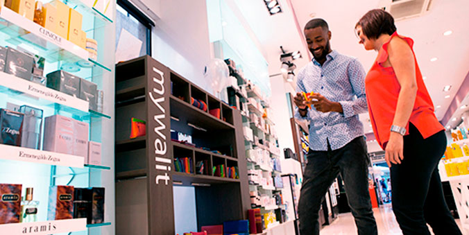 gentleman buying inside a perfume shop